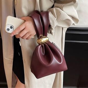Burgundy Faux Leather Bucket Wristlet with Gold Knot Accent